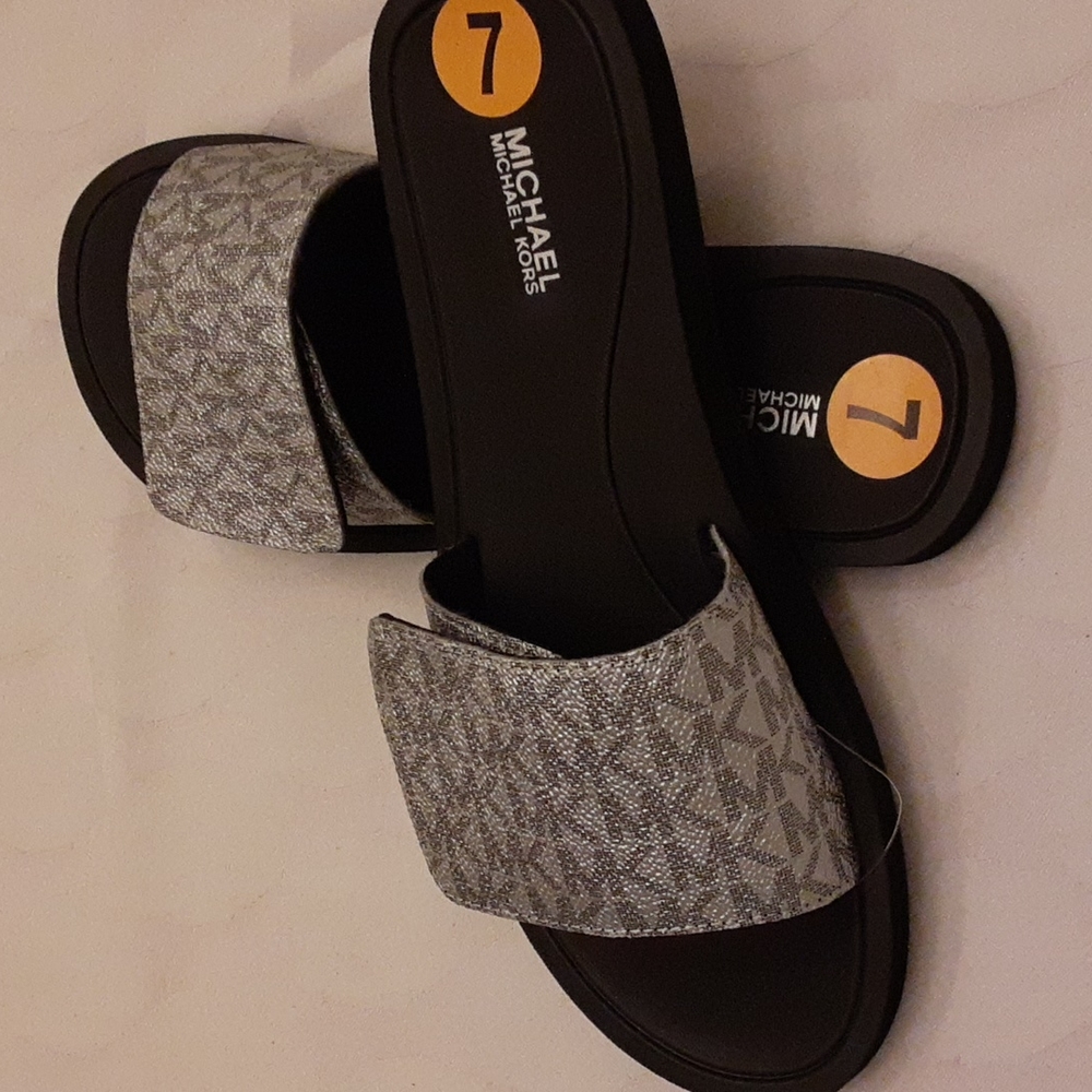 Michael Kors slides. NWOT. Size 7.